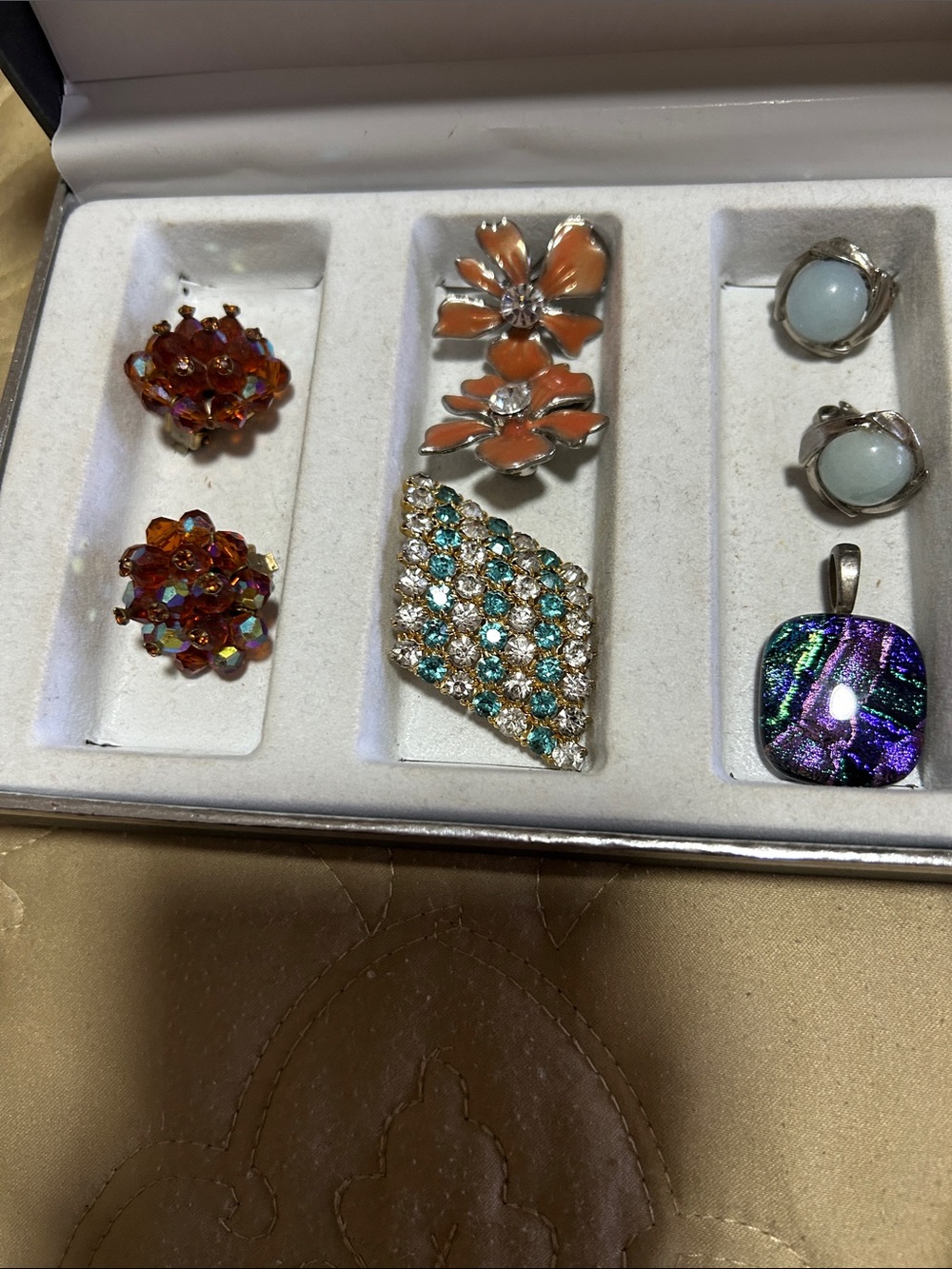 Assorted Womens Jewelry  3 sets of clips one broch, one pendant